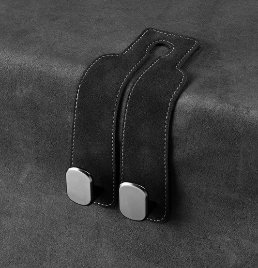 Multifunktionell dubbelkrok för bilsätets ryggstöd