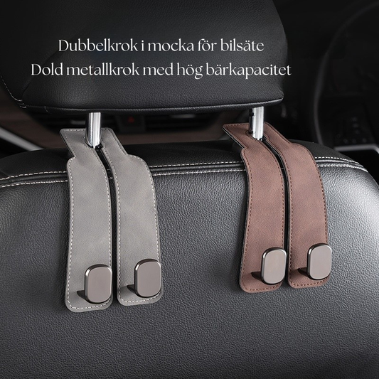 Multifunktionell dubbelkrok för bilsätets ryggstöd